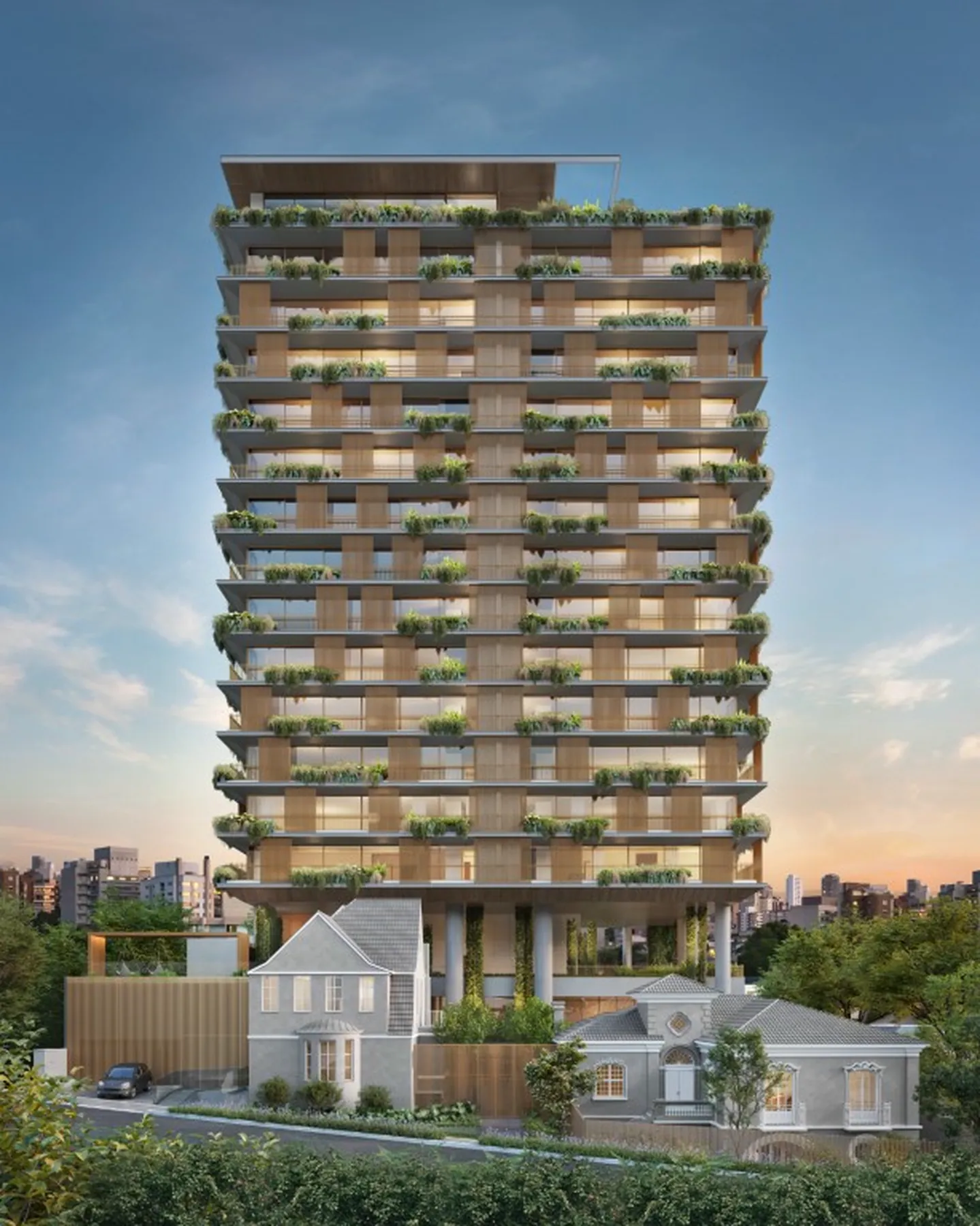 Torre ao entardecer com varandas ajardinadas